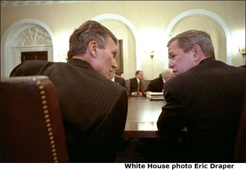 President George W. Bush talks with Democratic Sen. Tom Daschle of South Dakota during a bipartisan meeting of Congressional leaders in the Cabinet Room Jan. 23, 2002. White House photo Eric Draper.