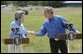 President George W. Bush and Japanese Prime Minister Junichiro Koizumi shake hands before beginning a news conference at the President's ranch near Crawford, Texas, Friday morning, May 23, 2003. White House photo by Eric Draper.