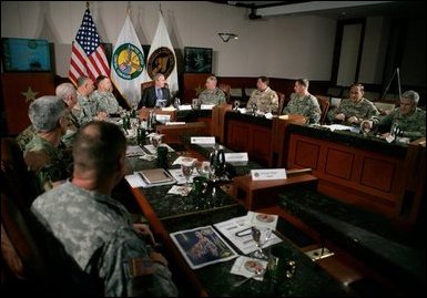 President George W. Bush joins CENTCOM and SOCOM Commanders for a briefing at the United States Central Command Headquarters in Tampa, Florida, Friday, Feb. 17, 2006. White House photo by Eric Draper