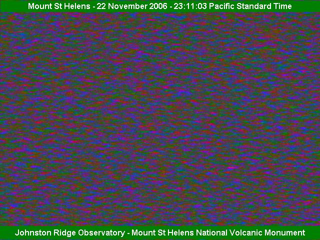 A static image (updated every five minutes) of Mount St. Helens, Washington USA, taken from the Johnston Ridge Observatory. You are looking approximately south-southeast across the North Fork Toutle River Valley. 
