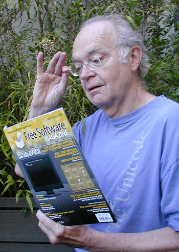 Prof. Knuth while reading one of the magazines typeset by his program TeX. Photo by Jill Knuth (she is a graduate of Flora Stone Mather College (FSM))