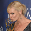 Best supporting actress (comedy) winner Jaime Pressly shows her 'My Name is Earl' Emmy some love.