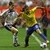 Brazil's Cristiane fights for the ball with Germany's Kerstin Garefrekes