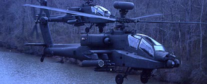 Photo of two AH-64 Apache Longbow helicopters