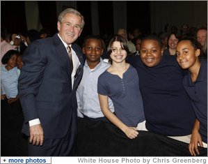 President George W. Bush poses with a group of students Thursday, Jan. 8, 2008, following his address at the General Philip Kearny School in Philadelphia, where President Bush spoke about the success of the No Child Left Behind Act and urged Congress to strenghten and reauthorize the legislation. White House photo by Chris Greenberg