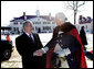 President George W. Bush shakes hands with General George Washington, played by actor Dean Malissa, following President Bushs address at the Mount Vernon Estate, Monday, Feb. 19, 2007 in Mount Vernon, Va., honoring Washingtons 275th birthday. White House photo by Eric Draper