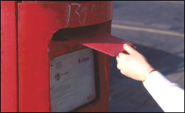 Image: Posting a letter.