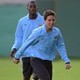 Samir Nasri and Yaya Toure of Manchester City attend a training session
