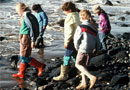 Children on the beach, Omaui. 