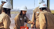 Group of BP employees working in the field