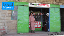 M-Kopa solar energy being sold in a small shop in Kenya